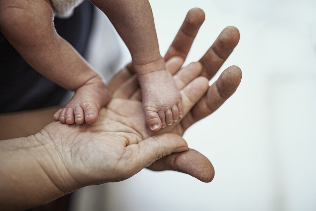 The father is Mexican the Mother is Canadian they are both in their 40s the mother had the baby at 47 years, but it was an In Vitro baby, the baby is a mixed race caucasian with Hispanic.