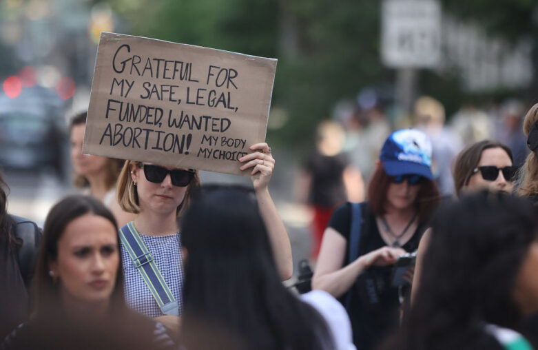 TORONTO, ON- JUNE 25 - Torontonians rally for abortion rights outside the U.S. Consulate at 360 University Avenue, in reaction to the American Supreme Court decision to strike down Roe V. Wade. in Toronto. June 25, 2022. (Steve Russell/Toronto Star via Getty Images)