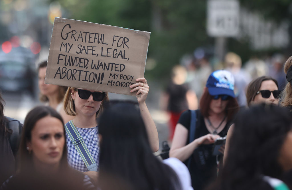 TORONTO, ON- JUNE 25 - Torontonians rally for abortion rights outside the U.S. Consulate at 360 University Avenue, in reaction to the American Supreme Court decision to strike down Roe V. Wade. in Toronto. June 25, 2022. (Steve Russell/Toronto Star via Getty Images)