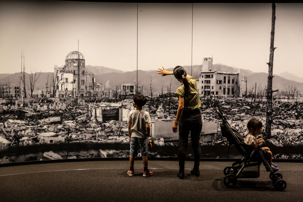 HIROSHIMA, JAPAN - AUGUST 05: Visitors at Hiroshima Peace Memorial Museum view a large scale panoramic photograph of the aftermath of the atomic bomb attack on Hiroshima, on August 05, 2022 in Hiroshima, Japan. This Saturday will mark the 77th anniversary of the atomic bombing of Hiroshima in which between 90,000 to 146,000 people were killed and the entire city destroyed in the first use of a nuclear weapon in armed conflict. Survivors and dignitaries including Japans Prime Minister Fumio Kishida and United Nations Secretary General Antonio Guterres will attend the commemoration. (Photo by Yuichi Yamazaki/Getty Images)