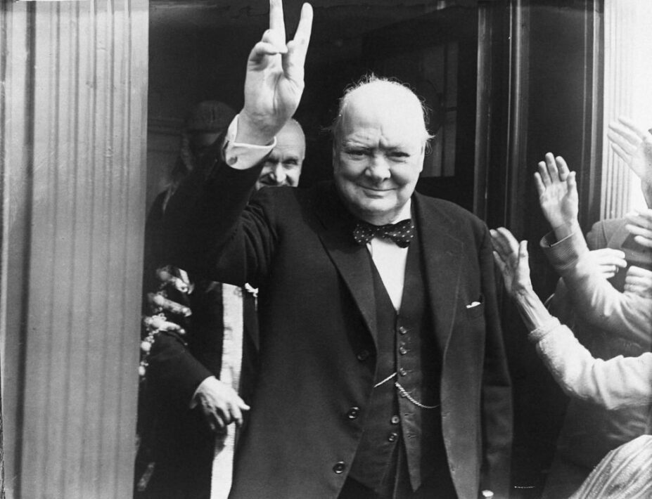 1951: British Prime Minister Winston Churchill (1874 - 1965) giving his famous wartime V-sign at Dover. (Photo by Central Press/Hulton Archive/Getty Images)