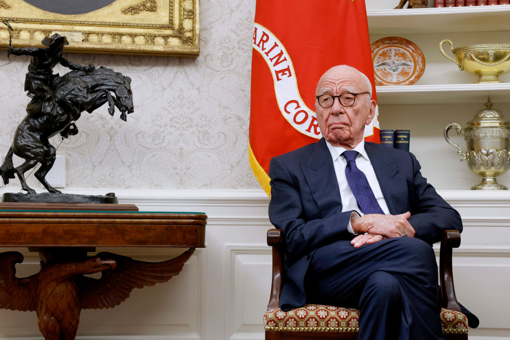 WASHINGTON, DC - FEBRUARY 03: Former Executive Chairman of Fox Corp Rupert Murdoch listens as U.S. President Donald Trump speaks to reporters in the Oval Office of the White House on February 03, 2025 in Washington, DC. After signing a series of executive orders and proclamations, Trump spoke to reporters about a range of topics including recent negotiations with Mexico on tarriffs. (Photo by Anna Moneymaker/Getty Images)