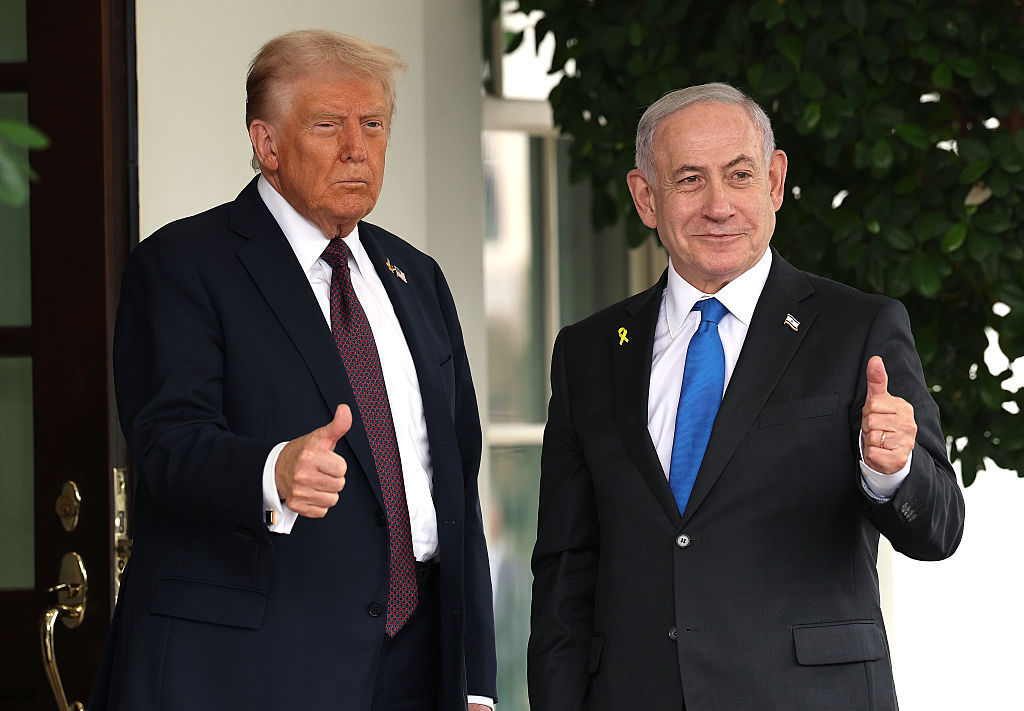 WASHINGTON, DC - SEPTEMBER 29: U.S. President Donald Trump (L) greets Israeli Prime Minister Benjamin Netanyahu as he arrives at the White House on September 29, 2025 in Washington, DC. In what will be their fourth meeting in Washington, Trump and Netanyahu are expected to discuss the latest U.S. backed plans to end the war in Gaza and free the remaining hostages held by Hamas. (Photo by Win McNamee/Getty Images)