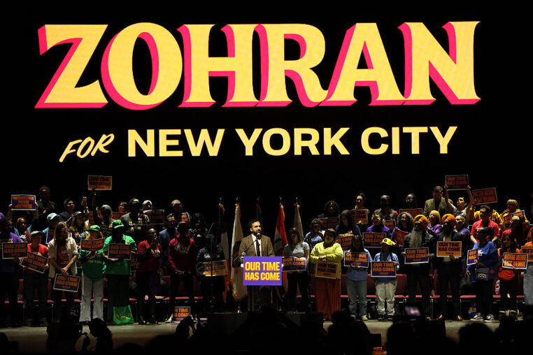 NEW YORK, NEW YORK - OCTOBER 13: New York City Mayoral candidate Zohran Mamdani speaks during a campaign rally at United Palace on October 13, 2025 in New York City. With the November 4th general election less than a month away, Mamdani, who maintains a double-digit lead over former Gov. Andrew Cuomo, held a rally to focus on his campaign promises for an affordable city for all residents, which include providing universal childcare, a rent freeze for rent-stabilized apartments, and free buses. Attorney General Letitia James made her first public appearance after her indictment, urging voters to support Mamdani. (Photo by Michael M. Santiago/Getty Images)